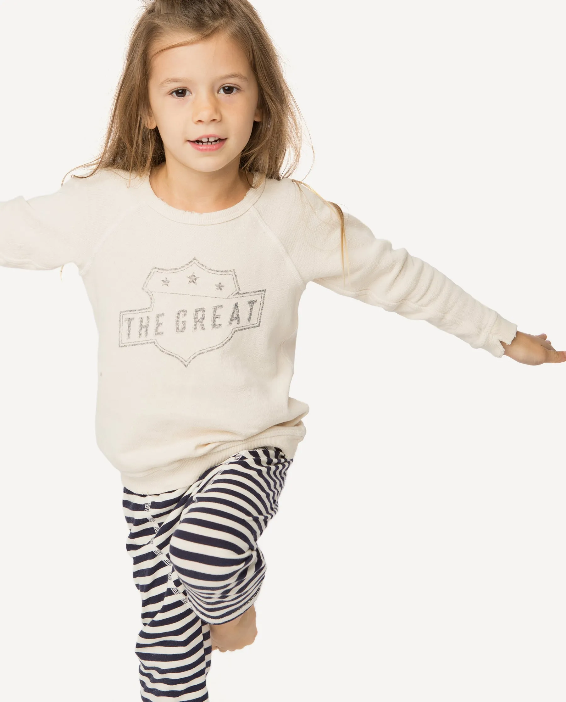 The Little College Sweatshirt. -- Vanilla with Navy Badge Graphic