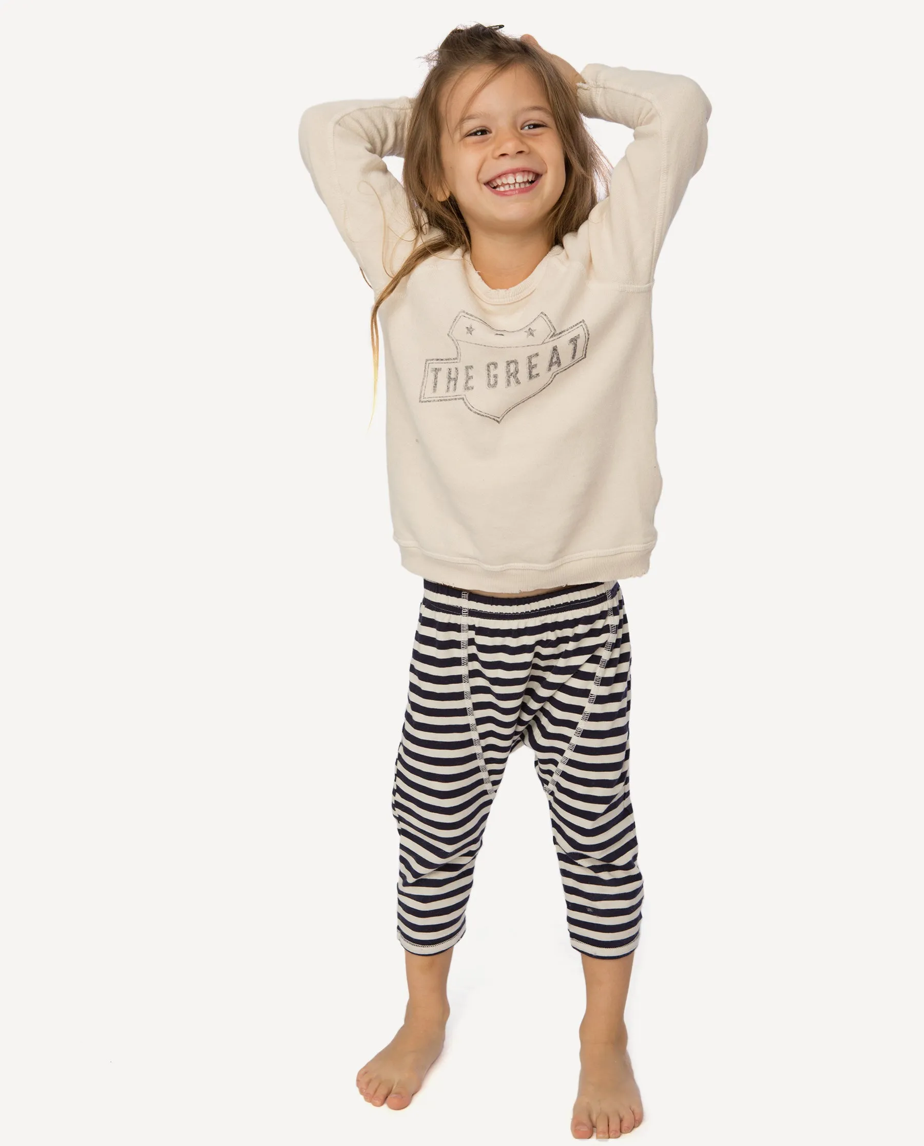 The Little College Sweatshirt. -- Vanilla with Navy Badge Graphic